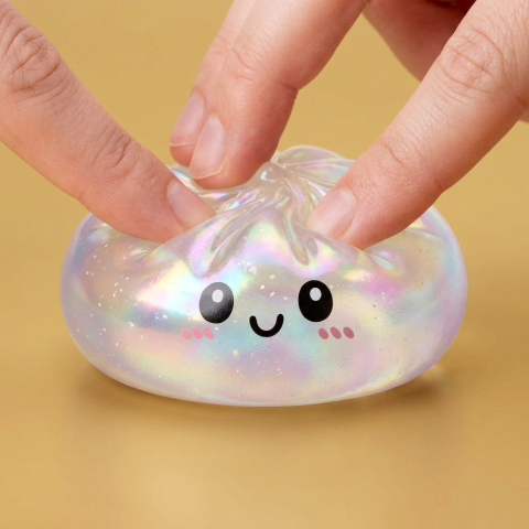 Squishy Dumpling Holographique Iridescent pressé dans la main, matière squishy