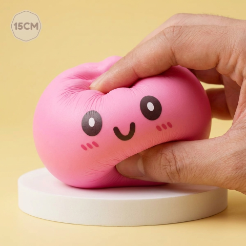 Dumpling Squishy Géant Rose — effet slow-rise, la mousse regonfle