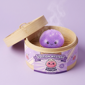 Dumpling Squishy Mystery Glow In Dark Glitter dans sa boîte panier vapeur façon bambou