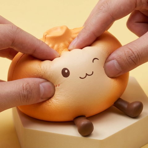 Giant Dumpling Squishy Orange — effet slow-rise, la mousse regonfle