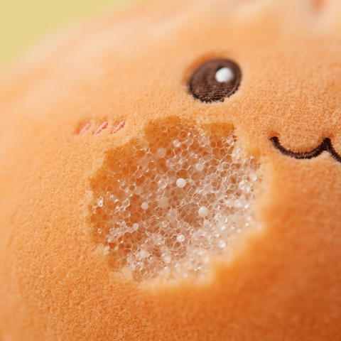 Giant Dumpling Squishy Orange — gros plan macro sur la texture