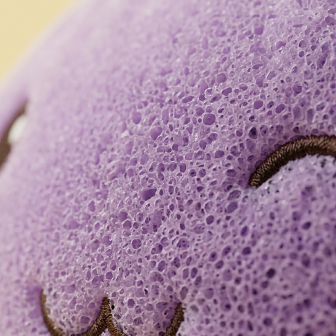 Dumpling Squishy Géant Violet — gros plan macro sur la texture