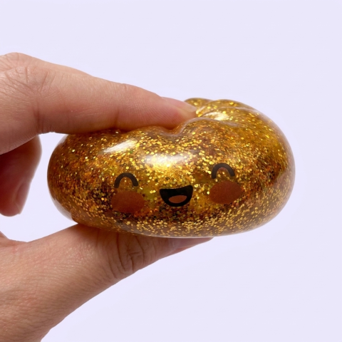 Squishy Bun Mystery Dumpling Surprise pressé dans la main, matière squishy