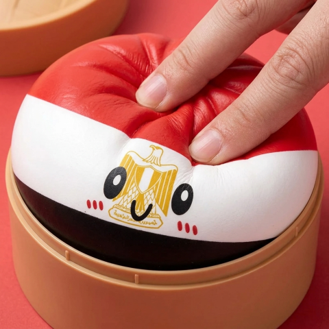 Squishy Dumpling Égypte pressé dans la main, matière squishy