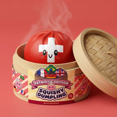 Squishy Dumpling Suisse dans sa boîte panier vapeur bambou