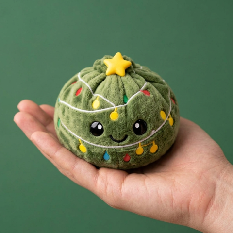 Squishy Dumpling Sapin de Noël Scintillant tenu en main, taille réelle