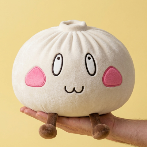Squishy Dumpling Géant Visage Joyeux tenu en main, taille réelle