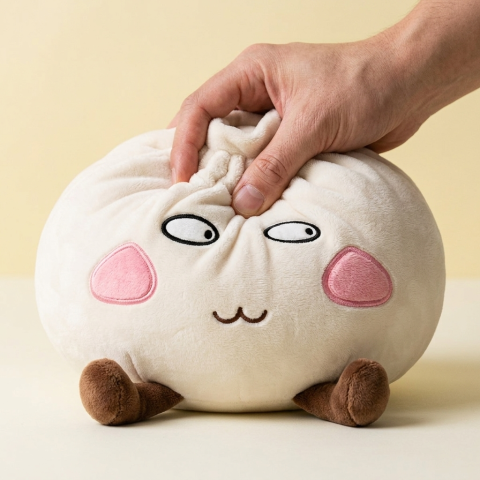 Squishy Dumpling Géant Fier et Malicieux — effet slow-rise, la mousse regonfle