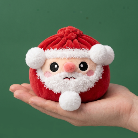 Squishy Dumpling Père Noël tenu en main, taille réelle
