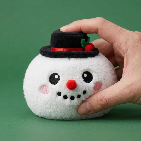 Squishy Dumpling Bonhomme de Neige Chapeau Haut-de-Forme pressé dans la main, matière squishy